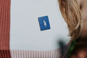 Wooden brooch Boat at sea 